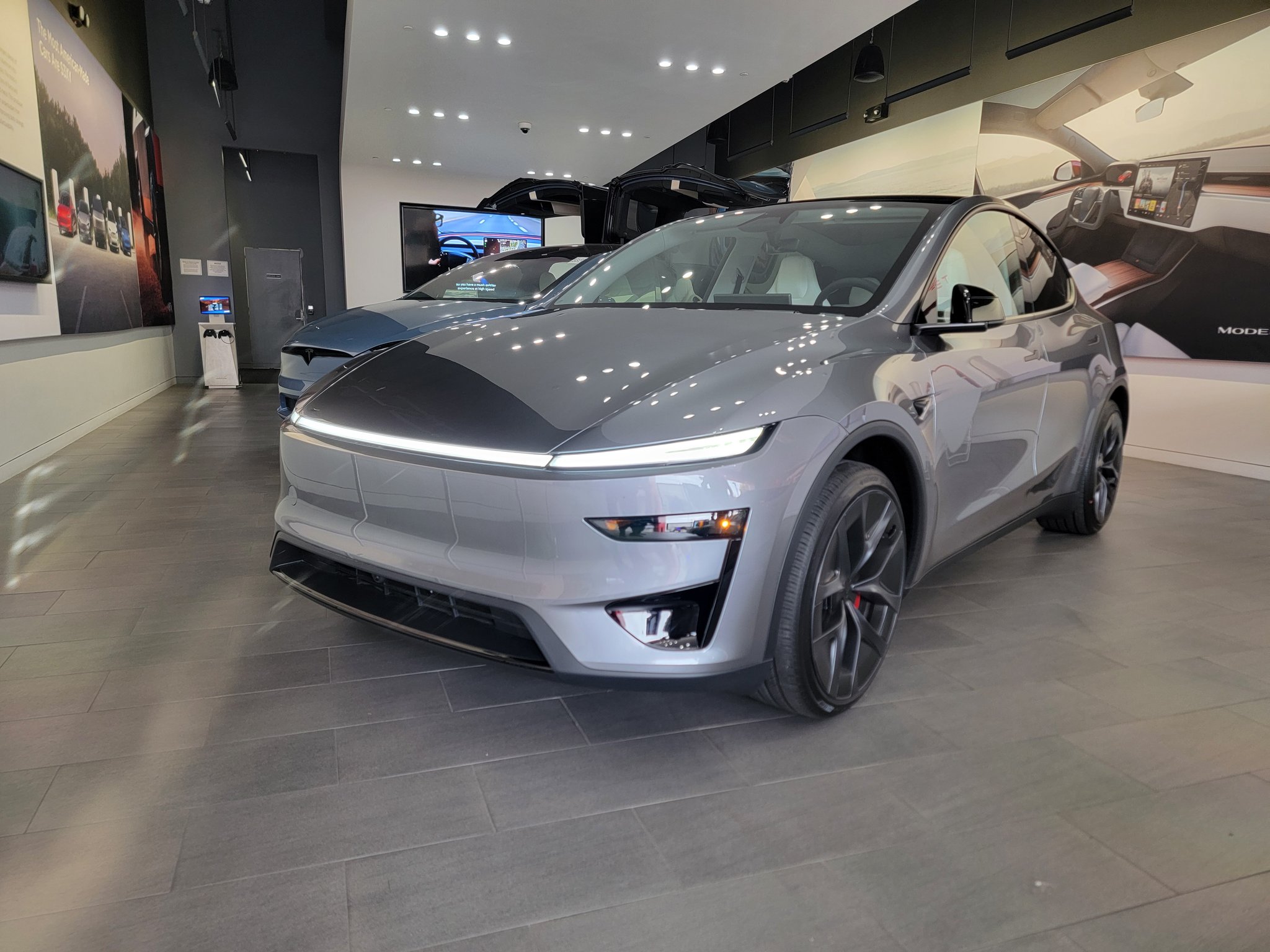 TeslaOracle_com's tweet card. Tesla puts the new Model Y Performance on display at its showrooms across the United States as customers wait for deliveries (pics, video, delivery estimates).