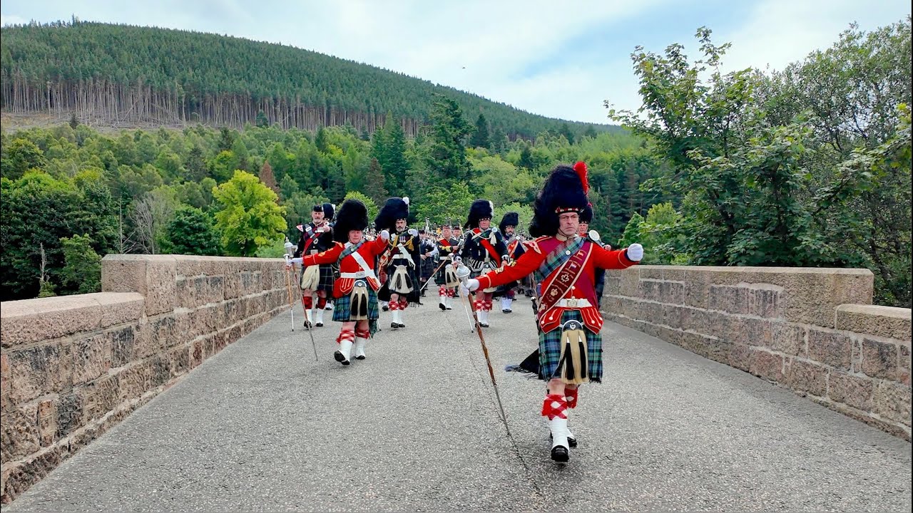 fossildotty's tweet card. Scotland the Brave as massed Pipe Bands march over river Dee to 2024...