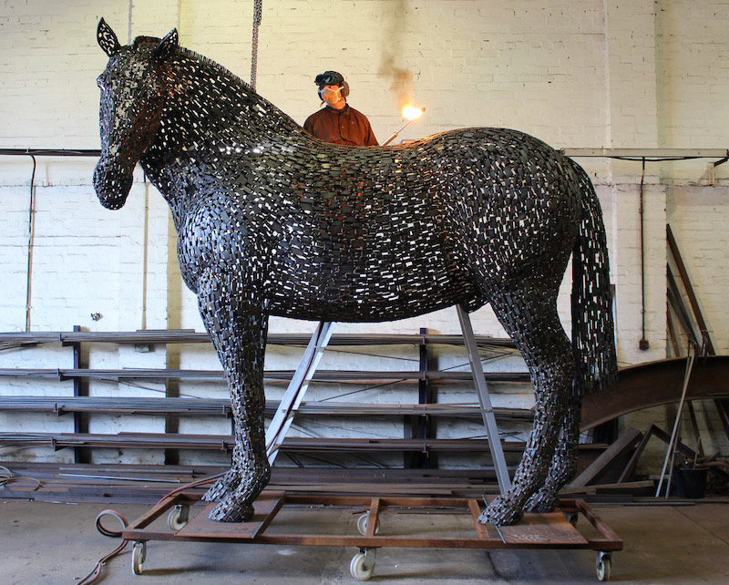 CulturalOffc's tweet card. The latest horse sculpture by the world-class Scottish sculptor Andy Scott will reside at the Percheron neighborhood in Colorado Springs.