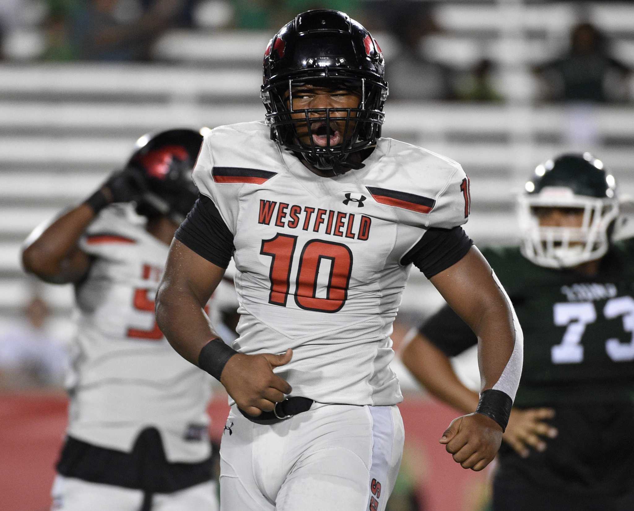 SpringSports's tweet card. All three Spring ISD football teams won in week 7 of District 16-6A play.