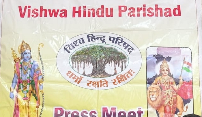 OpIndia_com's tweet card. VHP tweeted, "Hindus under threat or victimized by jihadist forces may approach our Bajrang dal Helpline numbers or their respective areas."