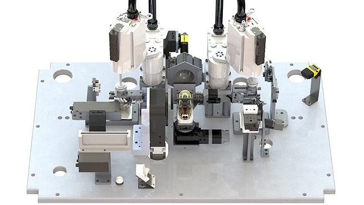 AssemblyMag1's tweet card. Digital twins facilitate design of robotic assembly systems, from prototype to high-volume production.