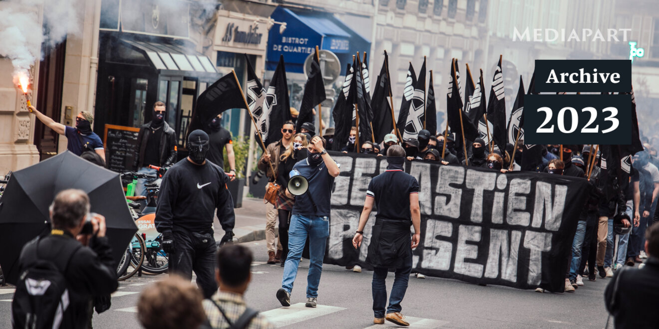 YannCasta's tweet card. Samedi 6 mai, des groupuscules néofascistes ont manifesté à Paris, en cagoules et masques noirs. Axel Loustau et Olivier Duguet, les deux anciens trésoriers du microparti de Marine Le Pen, Jeanne, ét…