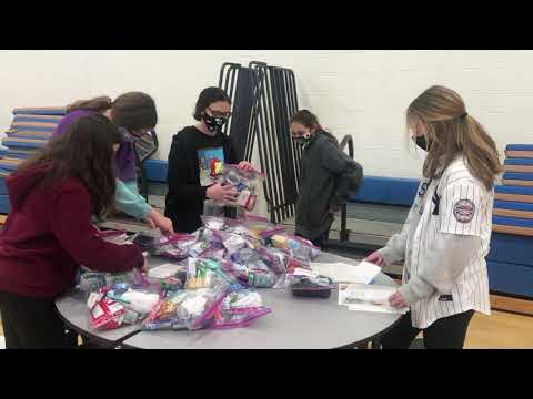 CuratoloLeah's tweet card. Blessing Bags