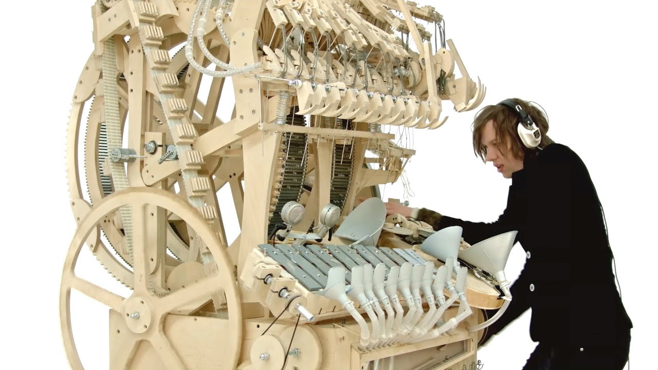 ZebMachine's tweet card. Wintergatan - Marble Machine (music instrument using 2000 marbles)