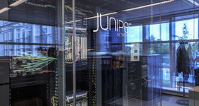 PortmanPartners's tweet card. SDxCentral's CEO connects with a long-time friend, who's also the Chief AI Officer at Juniper Netowrks, about AIOps and network automation