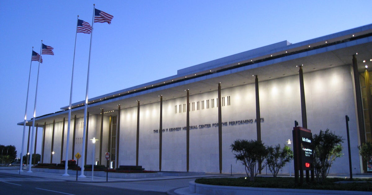 MacFarlaneNews's tweet card. Democratic Sen. Sheldon Whitehouse and Kennedy Center president Ric Grenell are clashing over the Kennedy Center's spending and operations.