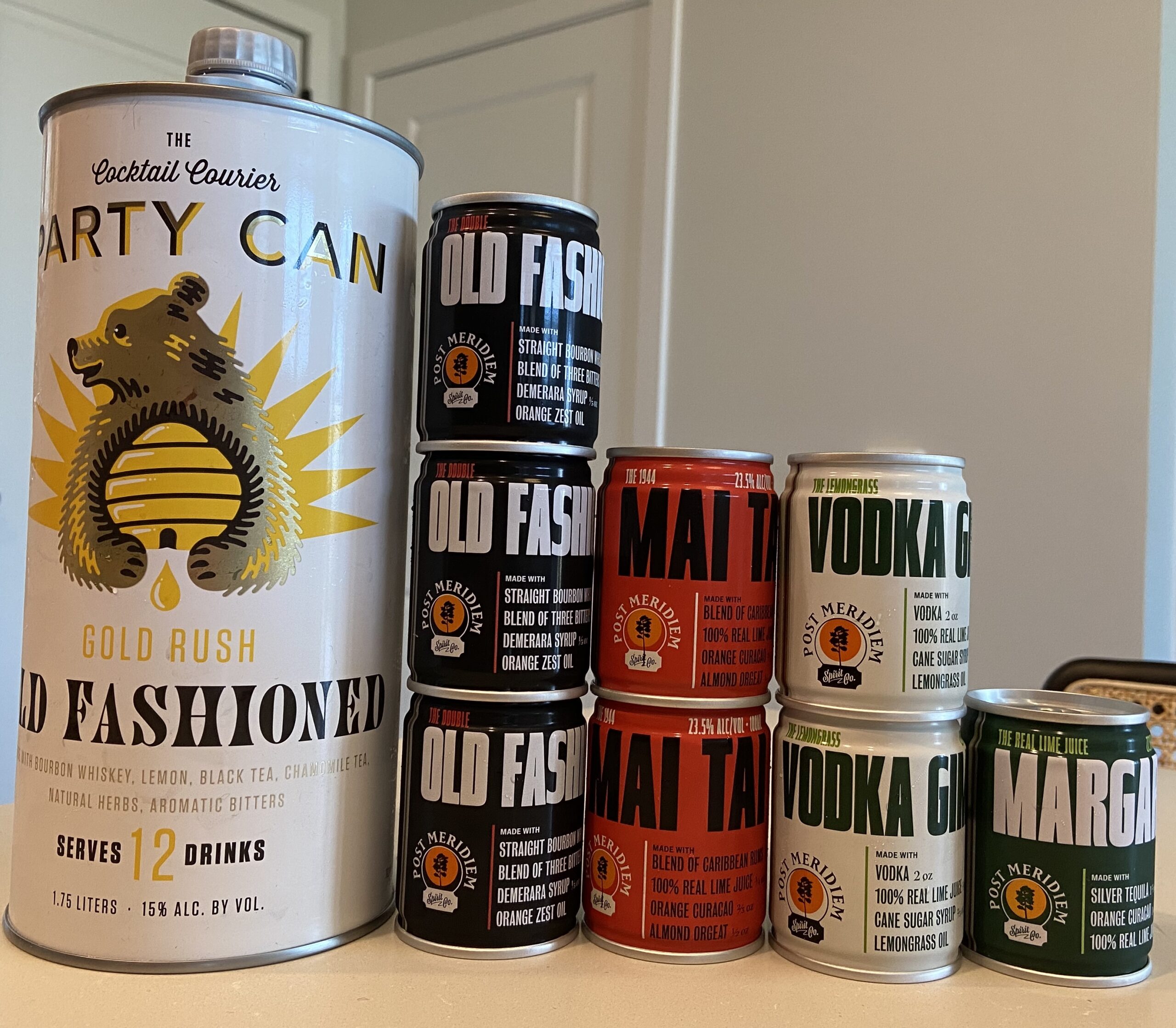 _thedailypour's tweet card. Tiny but strong Post Meridiem or a jumbo Party Can: Which of these canned cocktails should you buy for your next party or casual sipping session?