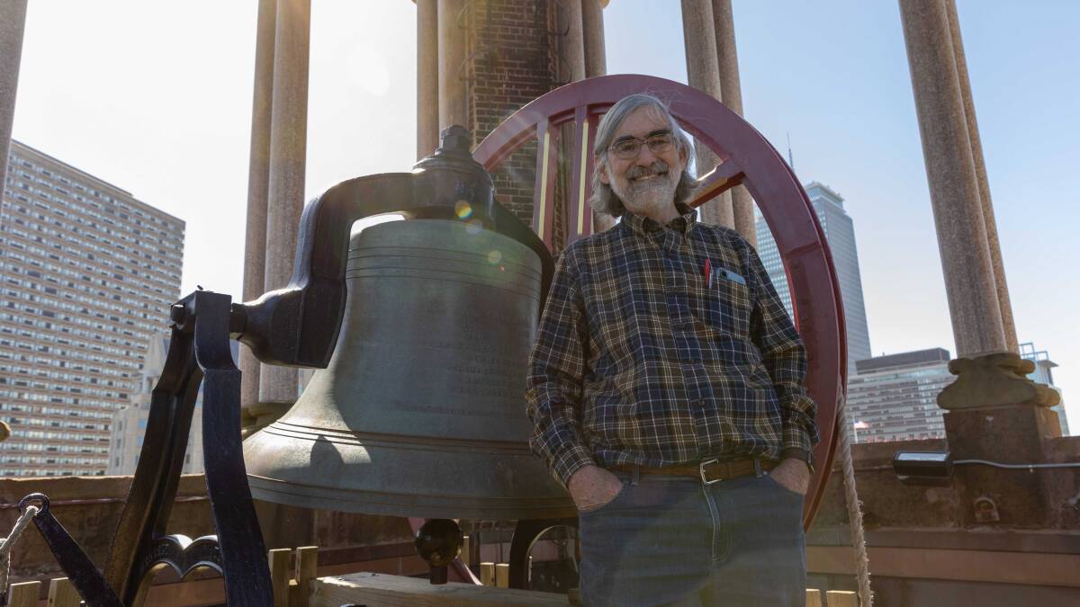 MITMath's tweet card. David Vogan has been ringing the bell to mark the marathon’s victors since the ’90s.