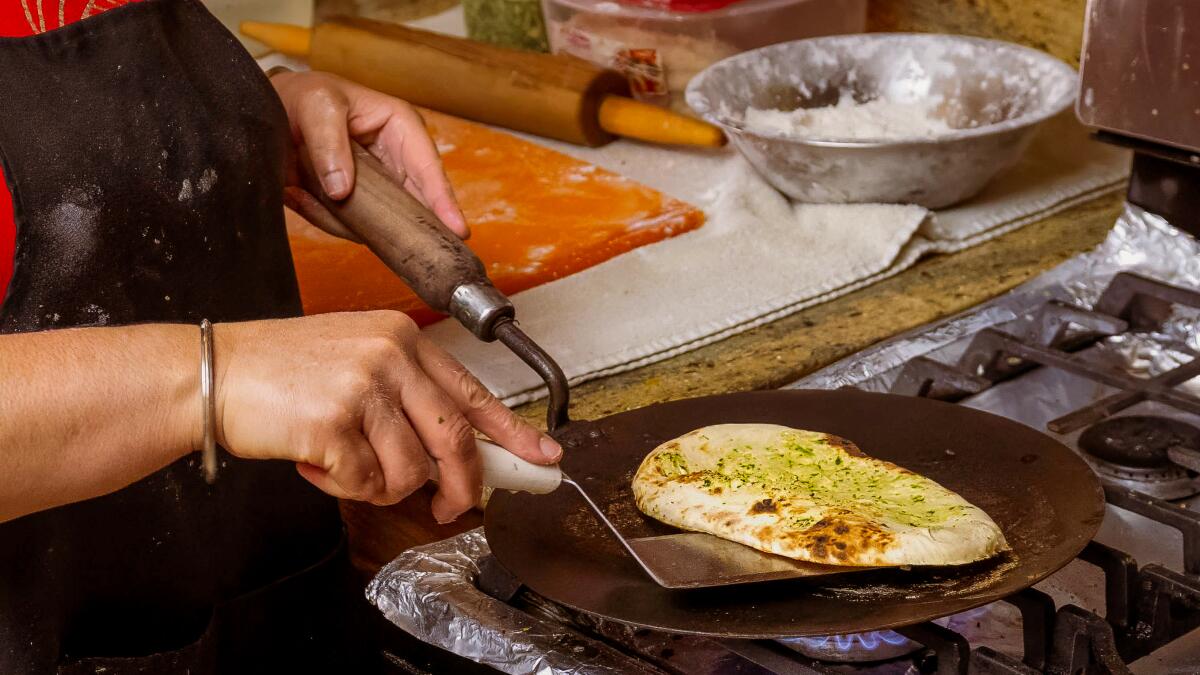 latimesfood's tweet card. Kulwant “Kimi” Sanghu started Cali Tardka as a lifeline to stability after her husband lost his job. Once on the brink of losing her house, she now has plans to take her home restaurant to the next...