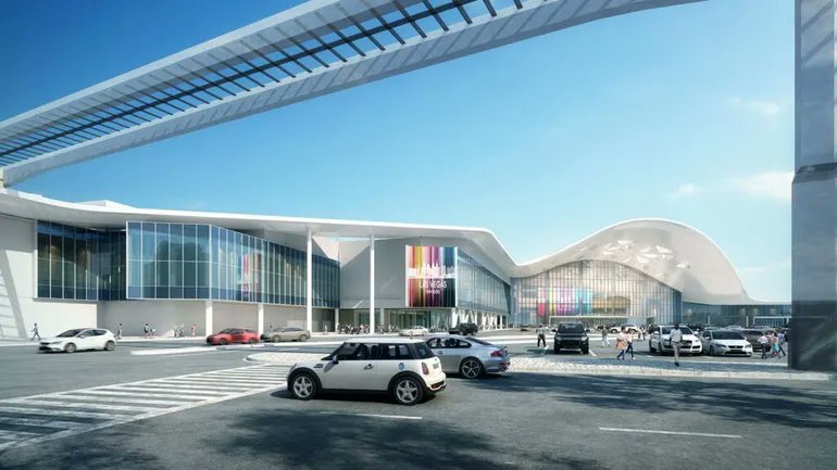 ALConcreteAssoc's tweet card. An AECOM Hunt-Penta JV recently placed the final beam on the city’s $600 million exhibition hall.