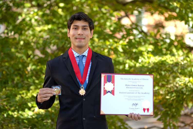 elmhurst_u's tweet card. Elmhurst University senior Mateo Gomez Bedoya has been named a Lincoln Student Laureate and the University’s 2025 recipient of the Abraham Lincoln Civic Engagement Award.