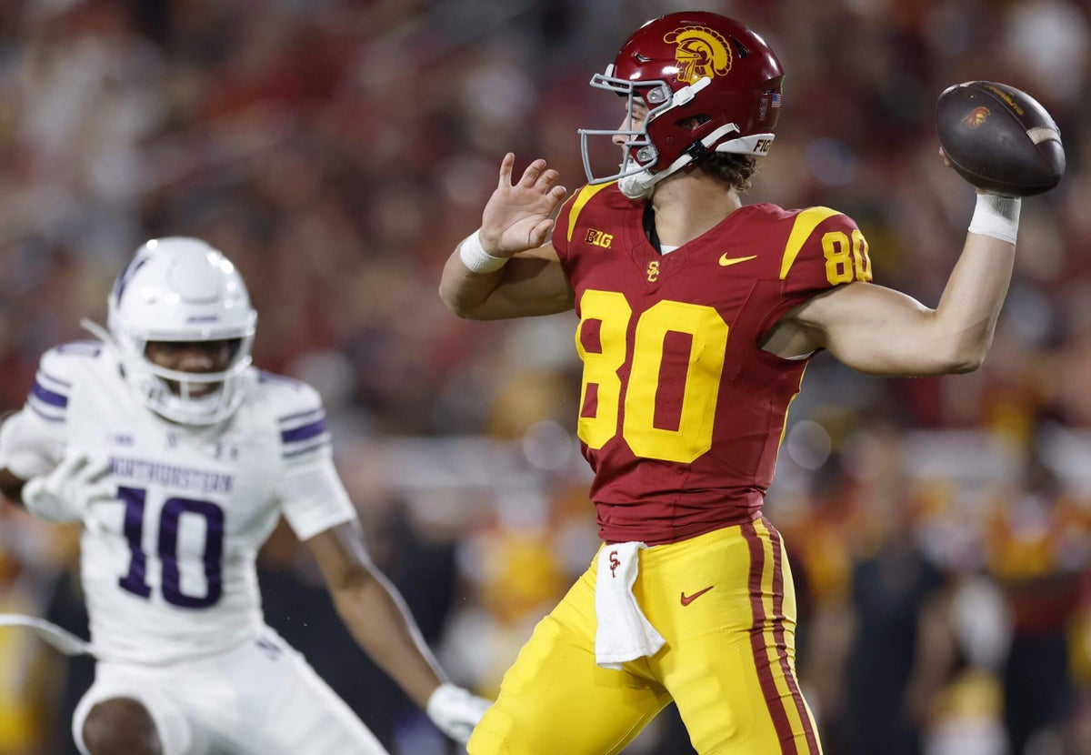 slmandel's tweet card. The Trojans' third-string quarterback, Sam Huard, wore punter Sam Johnson's number on a fake punt to fool the Northwestern defense.