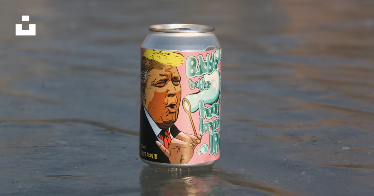DoWorkGreg's tweet card. "Bubble in the head" Double IPA by Crafters Brewing. Pictured on a frozen lake. – Download this photo by Jon Parry on Unsplash
