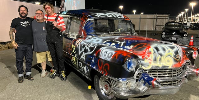 CARandDRIVER's tweet card. Car customizer Dave Shuten and graffiti artist Risk painted the Rogues Cadillac in front of a live audience.