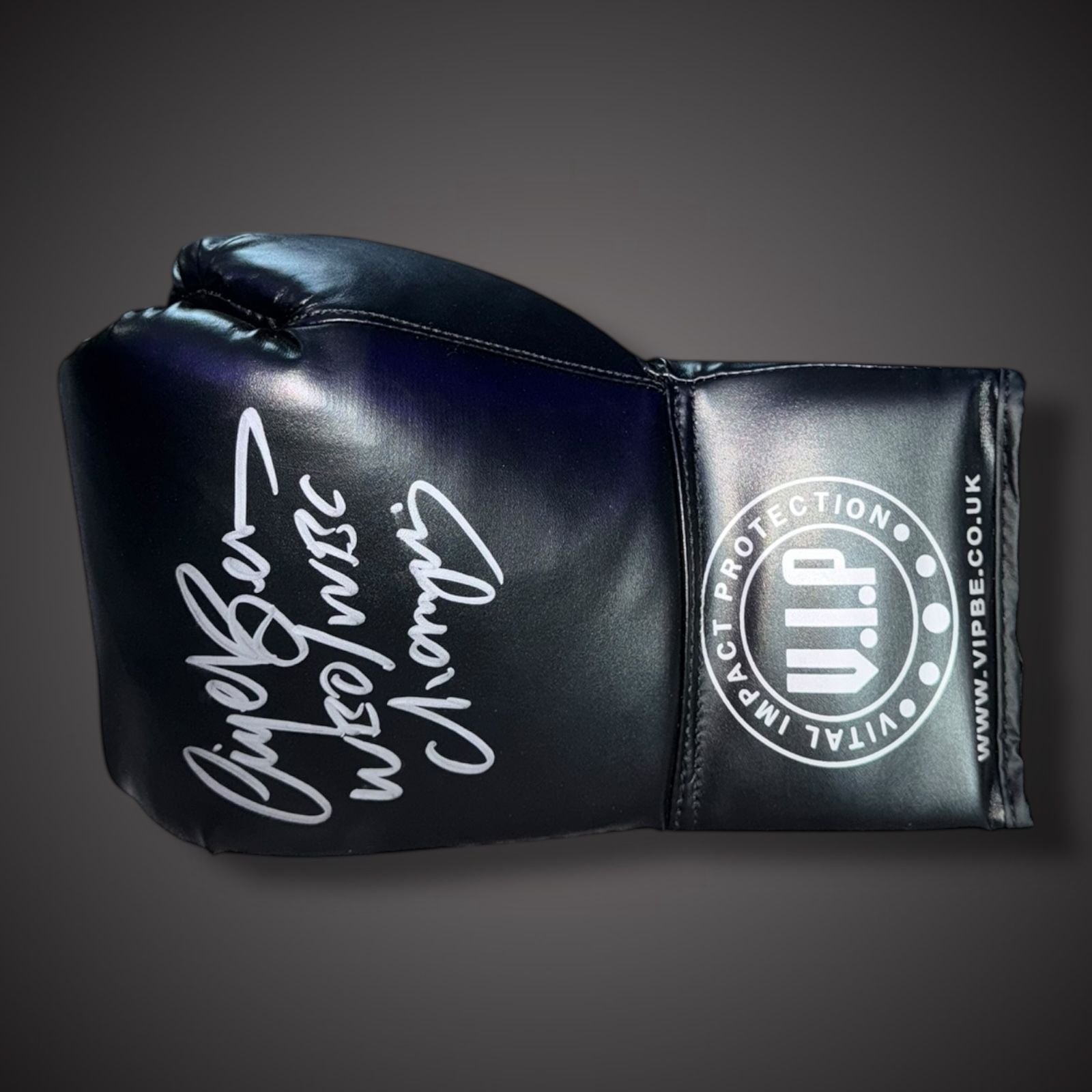 a1sportingspeak's tweet card. Nigel Benn 'Dark Destroyer' hand-signed boxing glove, a must-have for any boxing enthusiast and memorabilia collector. The glove comes with a Certificate of Authenticity, ensuring its legitimacy and...