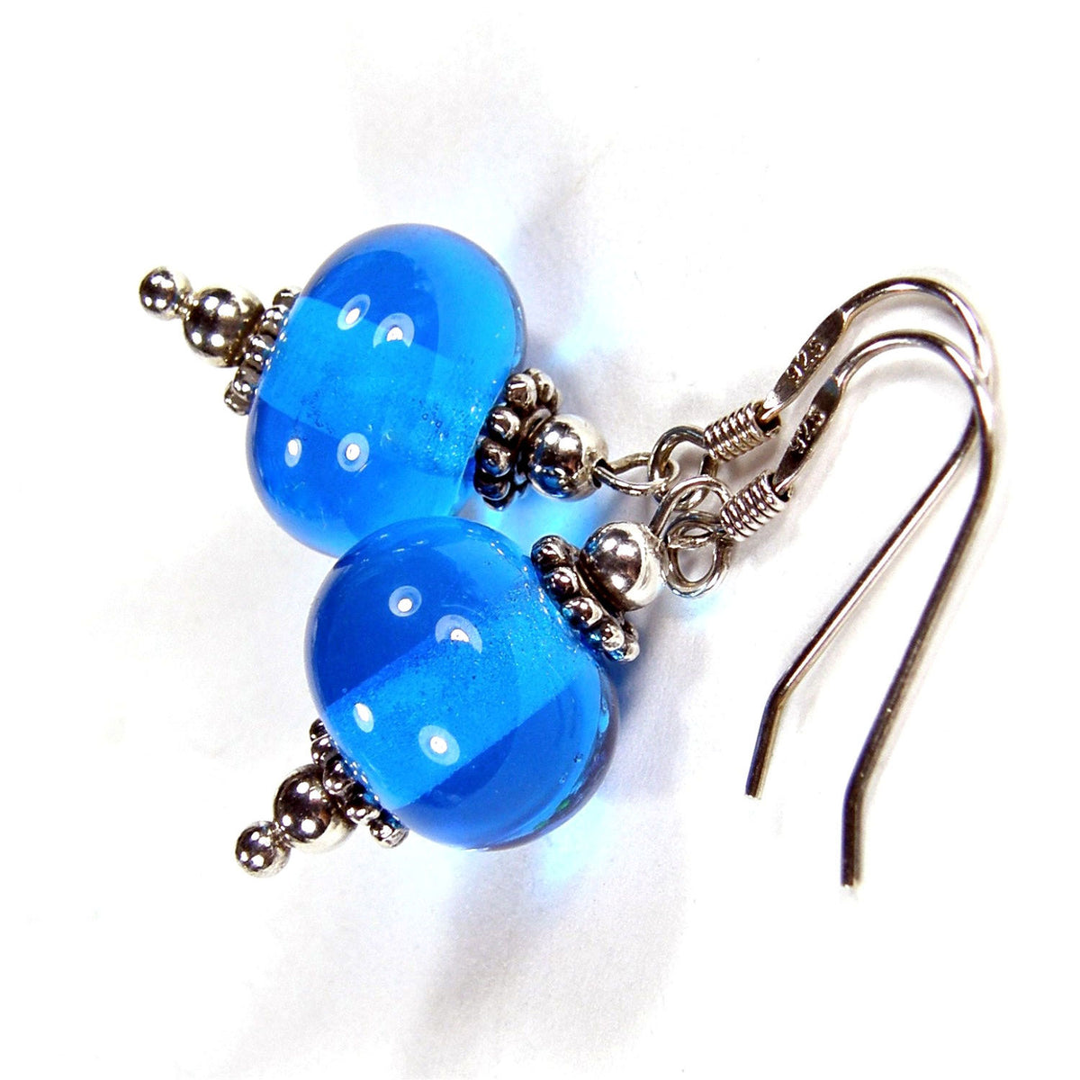 AndreaDesigns1's tweet card. Refreshing as a cool drink on a hot day.  These dark aqua blue lampwork earrings feature my artisan lampwork beads and sterling silver.    Aqua blue handmade lampwork beads: app 11mm, artisan...