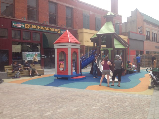 IthacaCommons's tweet card. The playground is here!!! Moments after the fence was removed from around the playground, kids were on it. It is a great magnet for kids of all ages, parents and grandparents. The light pole base c…