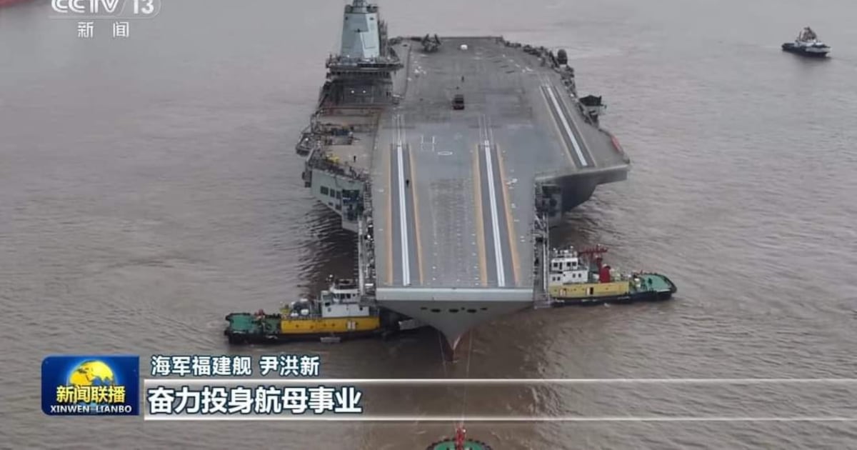 AgnieszkaSpace's tweet card. New TV footage shows the Fujian with fitted electromagnetic catapults in preparation for sea trial.