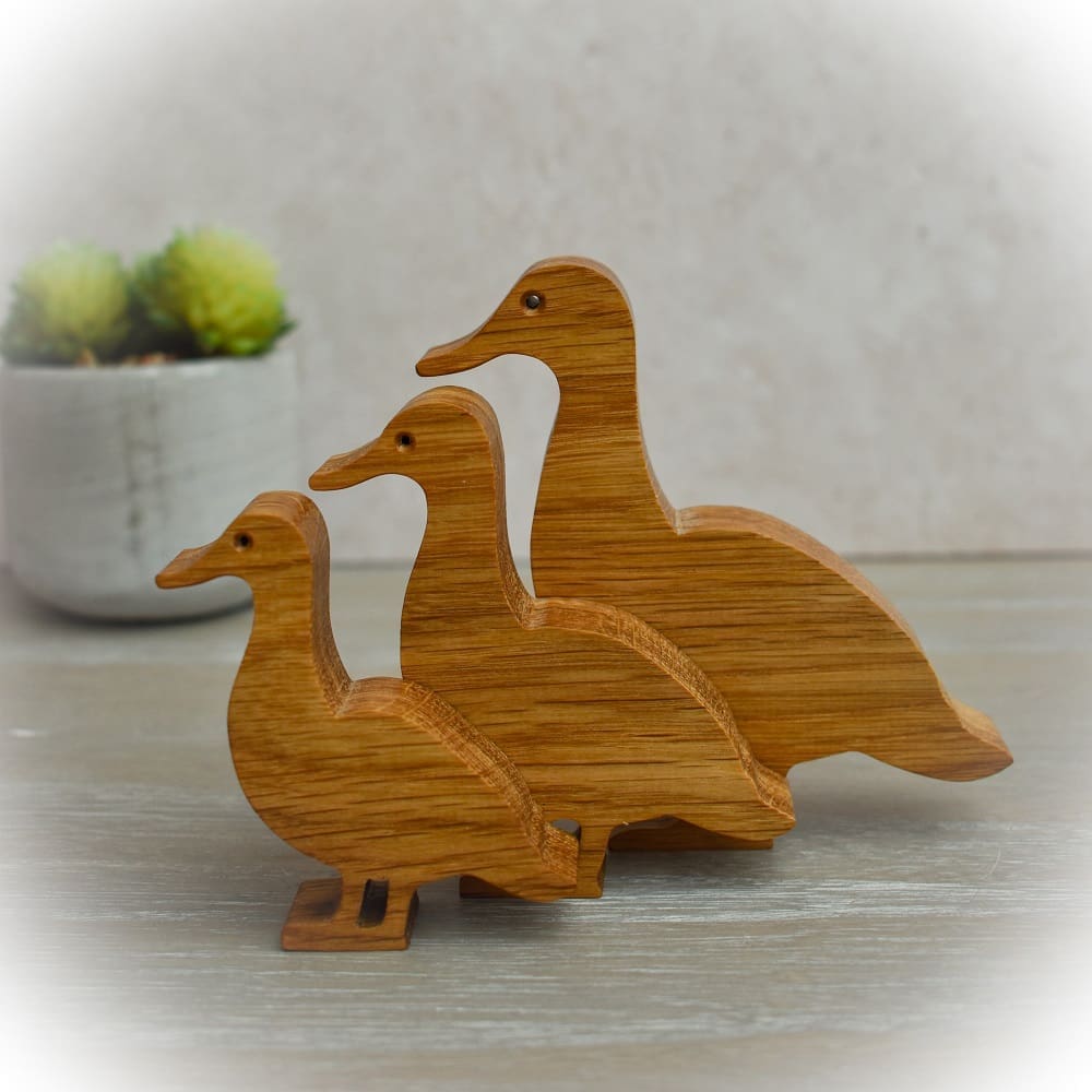 kblacey's tweet card. Wooden Ducks, set of three, oak. These lovely little ducks have been cut from Oak wood using a scroll saw and then coated with mineral oil and beeswax to give them a nice finish. These cute little...