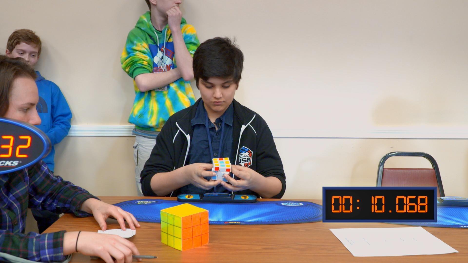 ArcDocs's tweet card. The coming-of-age story of a young Muslim American competing at Rubik cubing competitions.