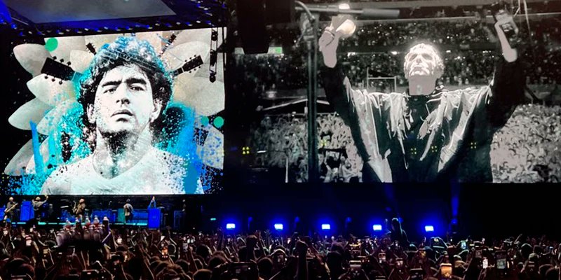 ArepaWeb's tweet card. Oasis, la banda de rock británico, volvió a Buenos Aires después de 16 años, y el Estadio Monumental River Plate se convirtió en escenario de una