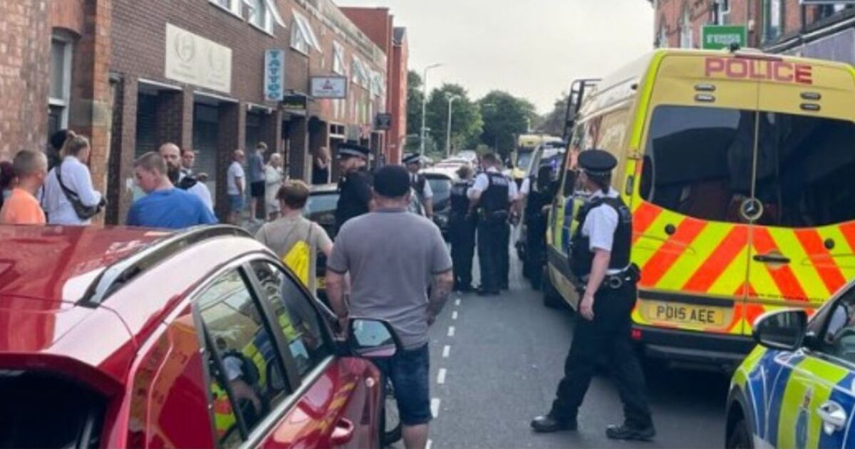 eden1971's tweet card. Reports suggest a man "with a knife" has been arrested near a vigil for three schoolgirls stabbed to death in Southport with a heavy police presence at the scene.