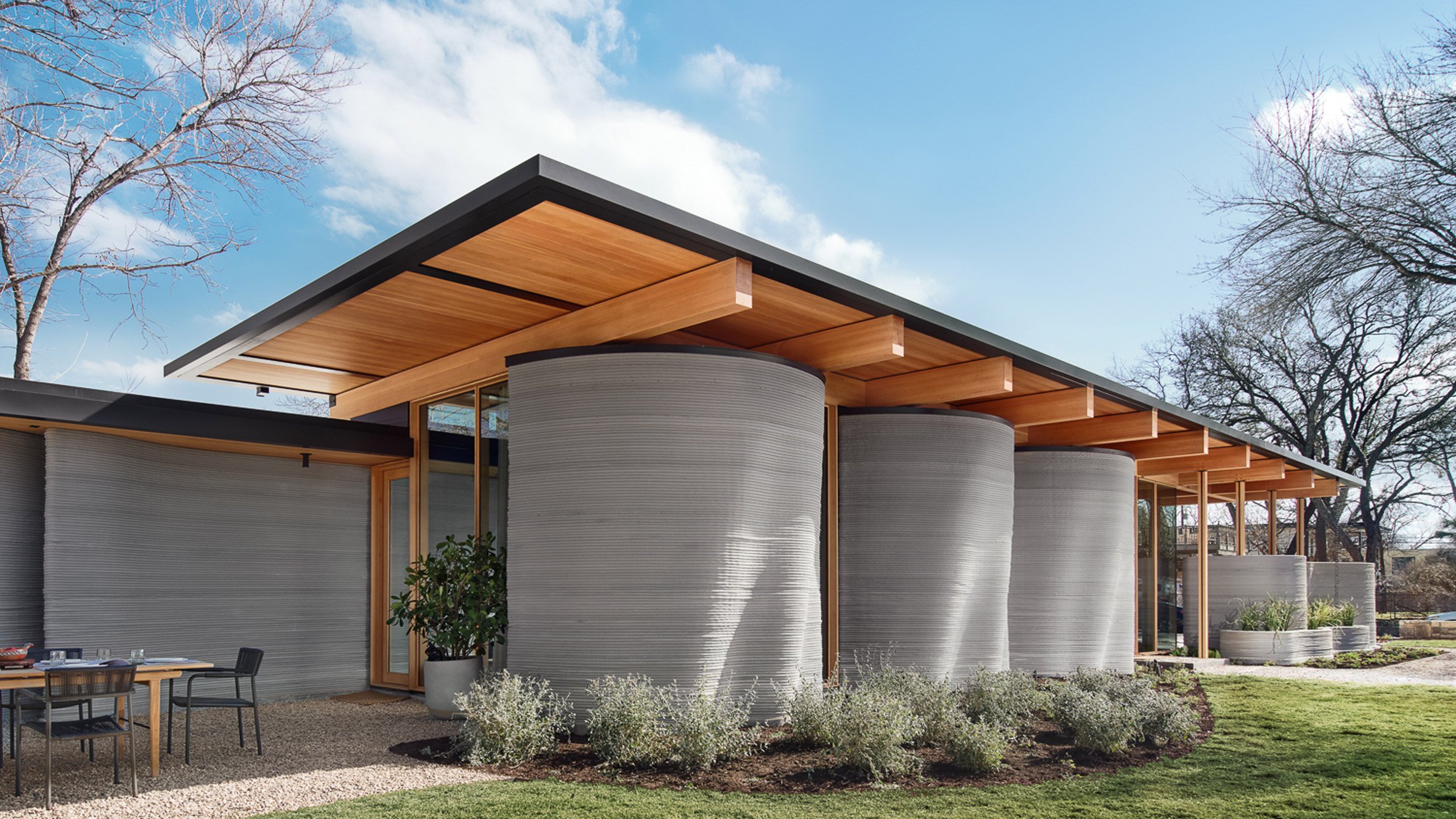 annefromaustin's tweet card. Contemporary architecture is highlighted in this Austin roundup, which features an extension perched above a ranch house and a 3D-printed home by Lake Flato