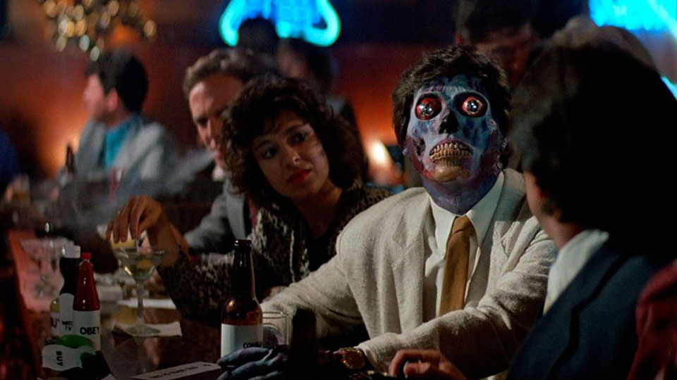 BoxReview_'s tweet card. They Live is a bold sci-fi cult classic that mixes action, satire, and alien intrigue to reveal a hidden world lurking beneath everyday reality. Put on your sunglasses!