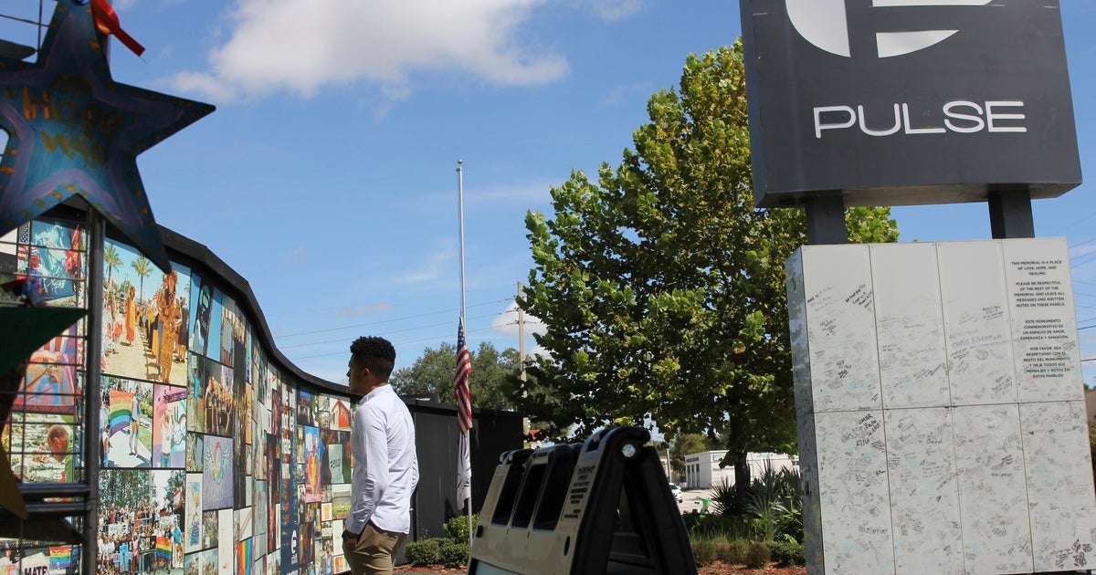 PaulBacon30's tweet card. The visits coincide with the shooting's nine-year mark. The city of Orlando plans to erect a permanent memorial for the victims after the Pulse nightclub building is torn down.