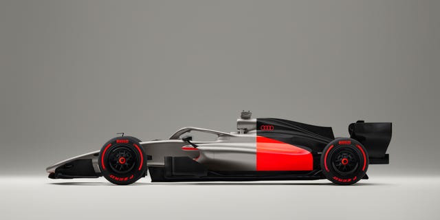 CARandDRIVER's tweet card. Audi revealed the 2026 F1 car livery, explained why it's getting into the racing series right now, and let us tour its new racing facility.