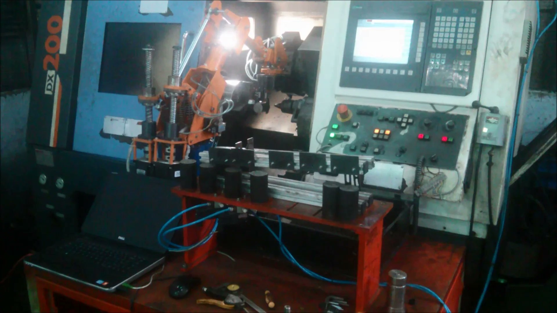 _robotsalive's tweet card. CNC Robotic Machine Tending