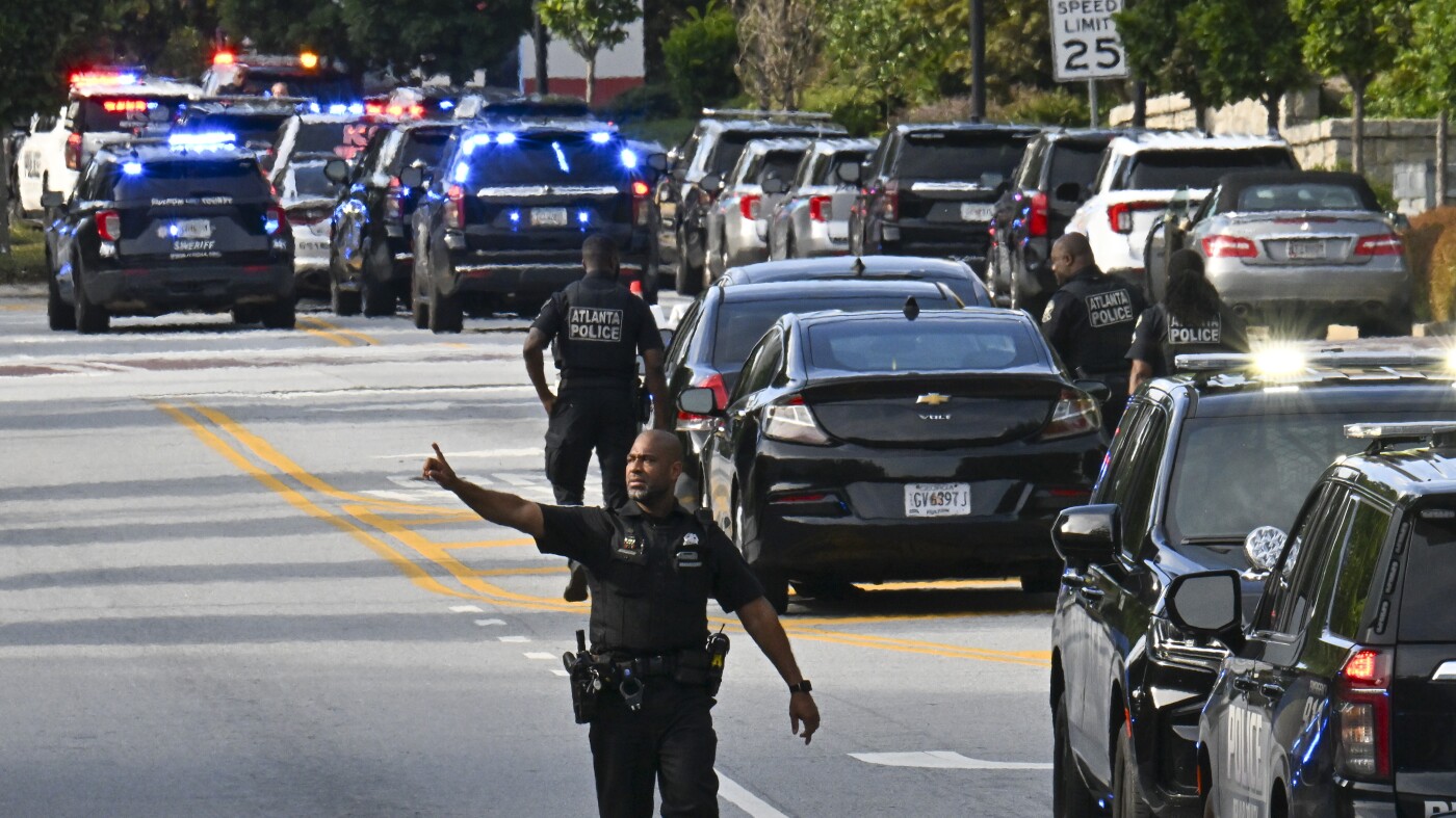 DemocracyGhost's tweet card. The Georgia Bureau of Investigation identified the man who opened fire at the Centers for Disease Control and Prevention as Patrick Joseph White. White died and a police officer was shot and killed.