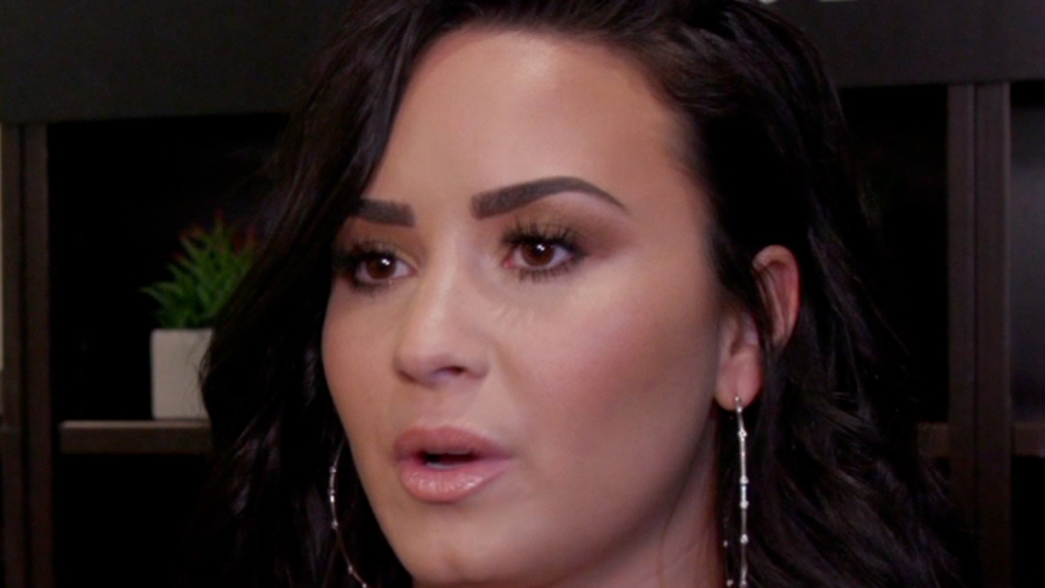 TMZ's tweet card. Demi Lovato suffers apparent heroin overdose and is rushed to a hospital.