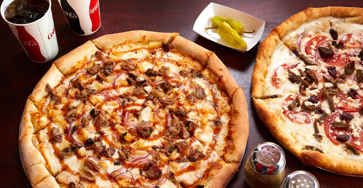 SeahawksViews's tweet card. Does pineapple belong on pizza? Debate now!