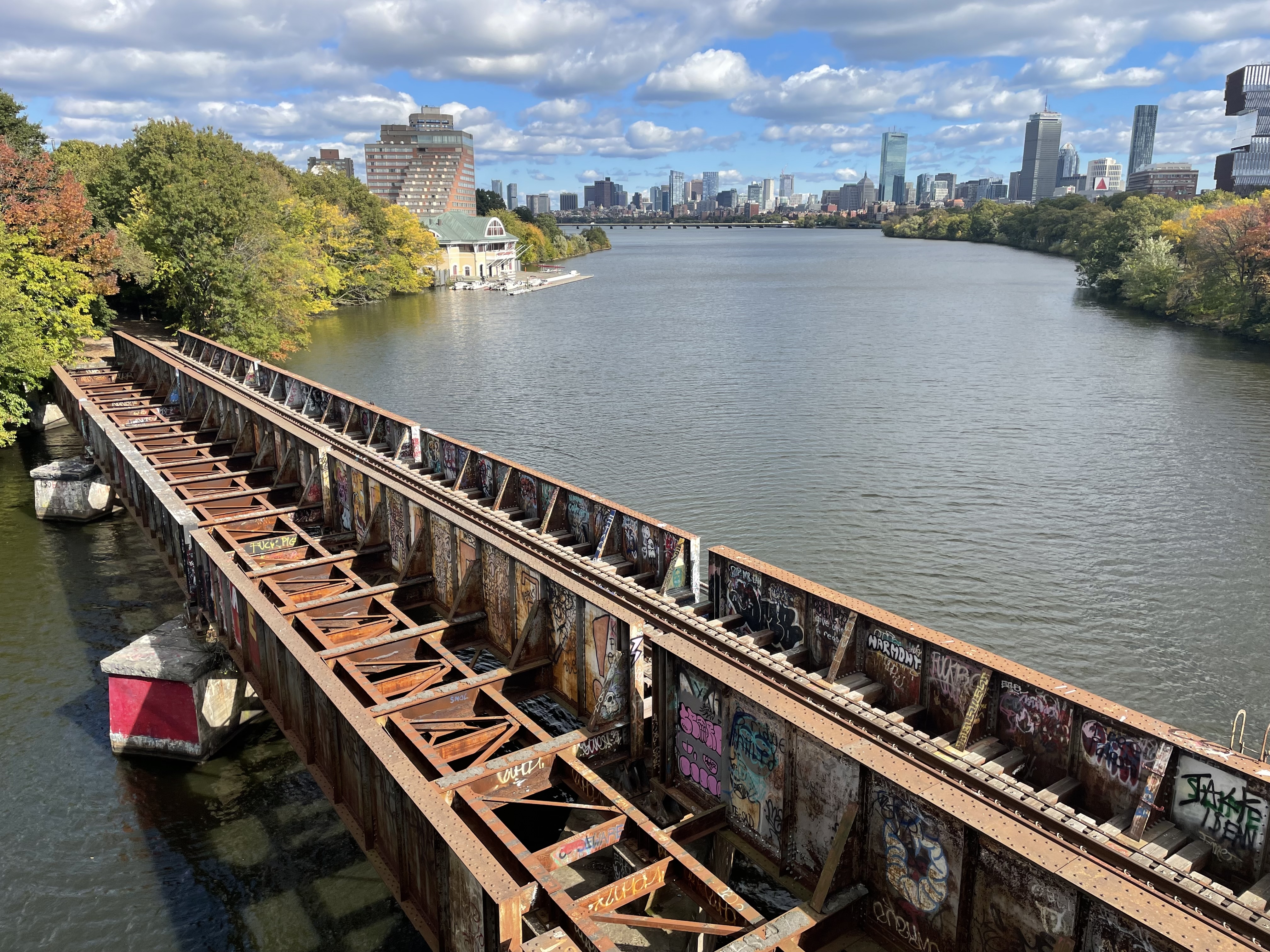 who_shot_jgr's tweet card. MBTA officials warn that commuter rail service "would cease within weeks" if MassDOT follows through on plans to demolish a critical rail bridge for the Allston Multimodal Project in Boston.
