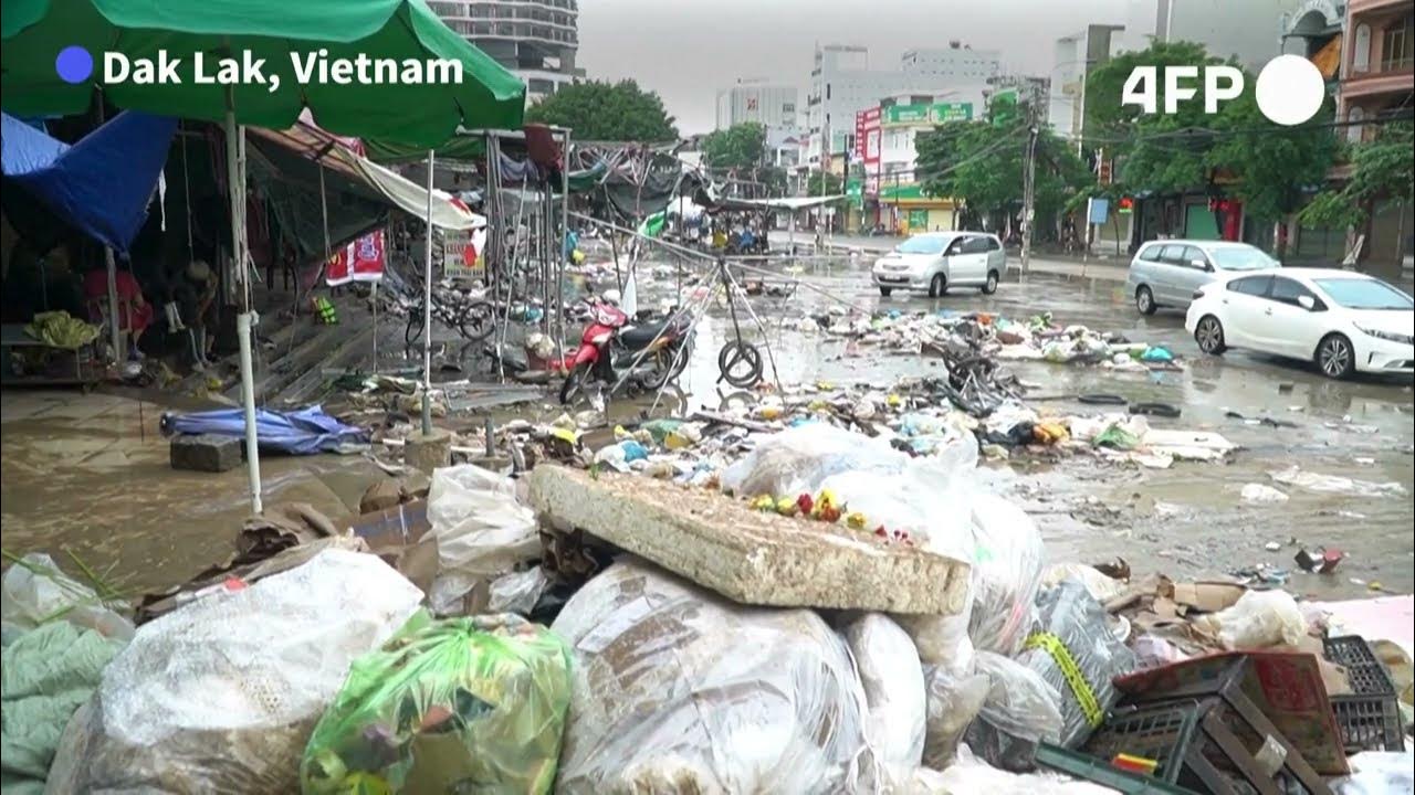 MizzimaNews's tweet card. Market traders pick up the pieces after deadly Vietnam flooding