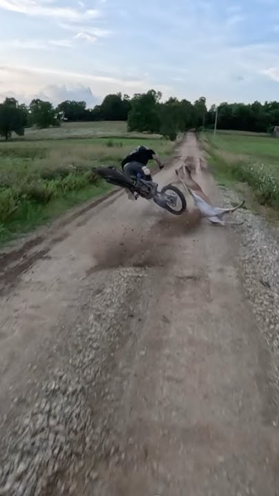 ac6ac3's tweet card. Deer rudely interrupts dirt bike race