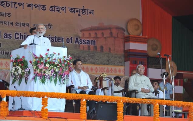 narendramodi's tweet card. PM addresses gathering at the swearing-in ceremony of the Council of Ministers of Assam