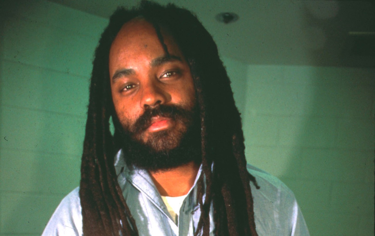 NewBlackMan's tweet card. Incarcerated for 44 years, the political prisoner remains unbowed in the face of medical neglect.