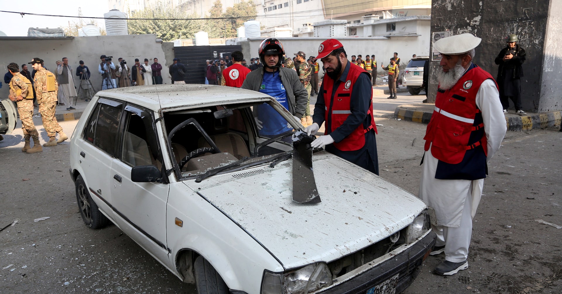 amritabhinder's tweet card. Three suicide bombers targeted the headquarters of a Pakistani paramilitary force on Monday, killing three personnel and wounding at least five, authorities said.
