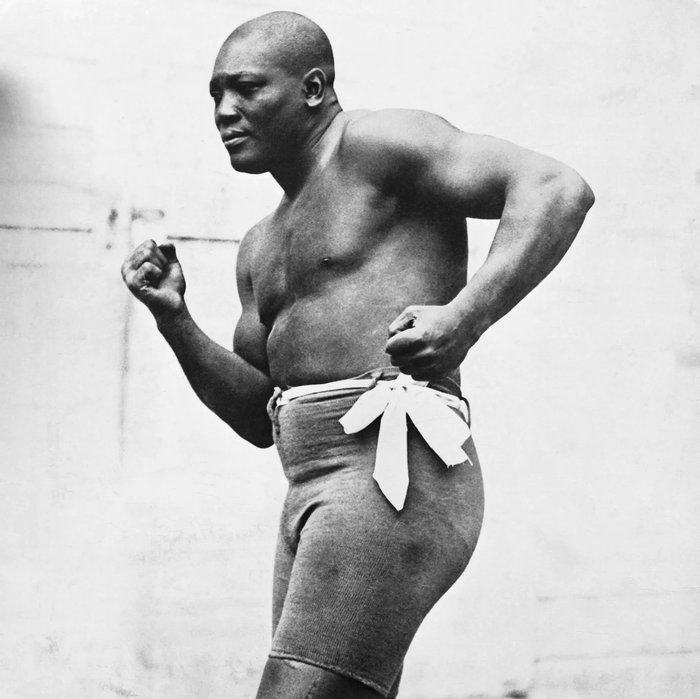 bafsolutions's tweet card. Jack Arthur Johnson (March 31, 1878 – June 10, 1946) — the first African American heavyweight boxing champion — wasn’t just a fighter, he was a symbol of Black defiance in Jim Crow America. At a time...