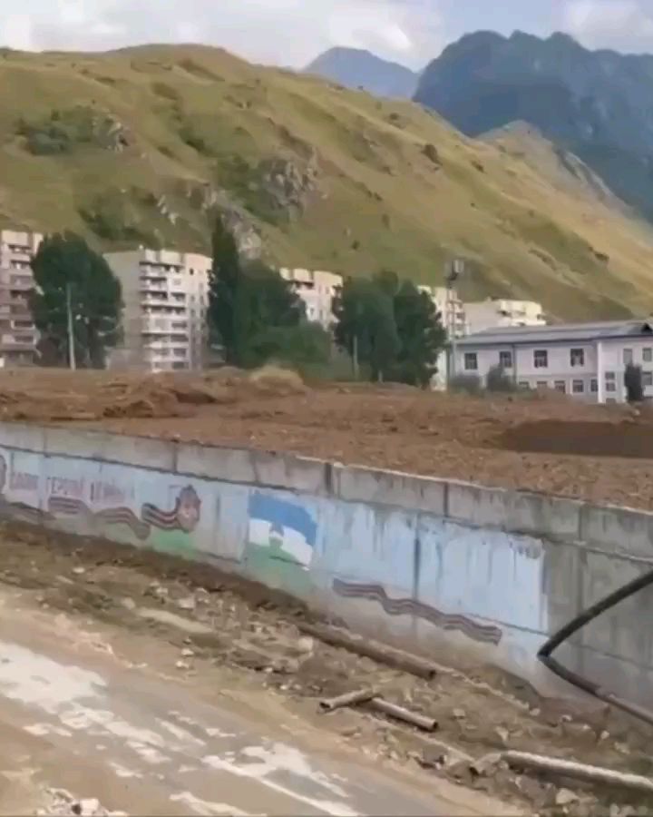 Patrickneenan2's tweet card. Russia declared an urgent evacuation in Tyrnyauz, the country's highest altitude city, after a mudflow from the Gerkhojan Suu River struck the area. With further flows feared, residents and tourist...