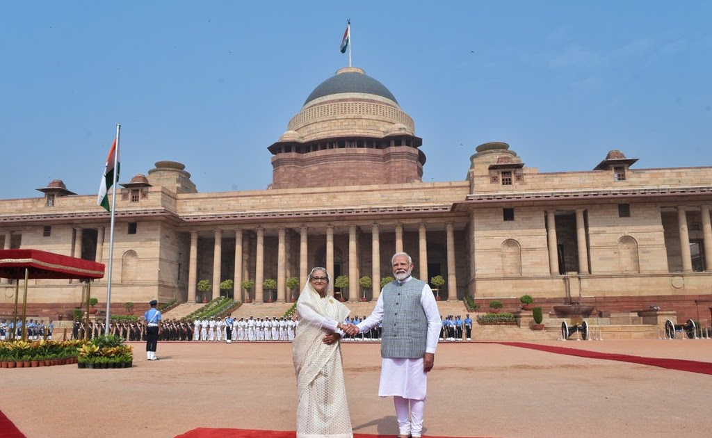 writesaket's tweet card. Bangladesh sentences Sheikh Hasina to death over 2024 crackdown; India’s silence raises diplomatic questions.