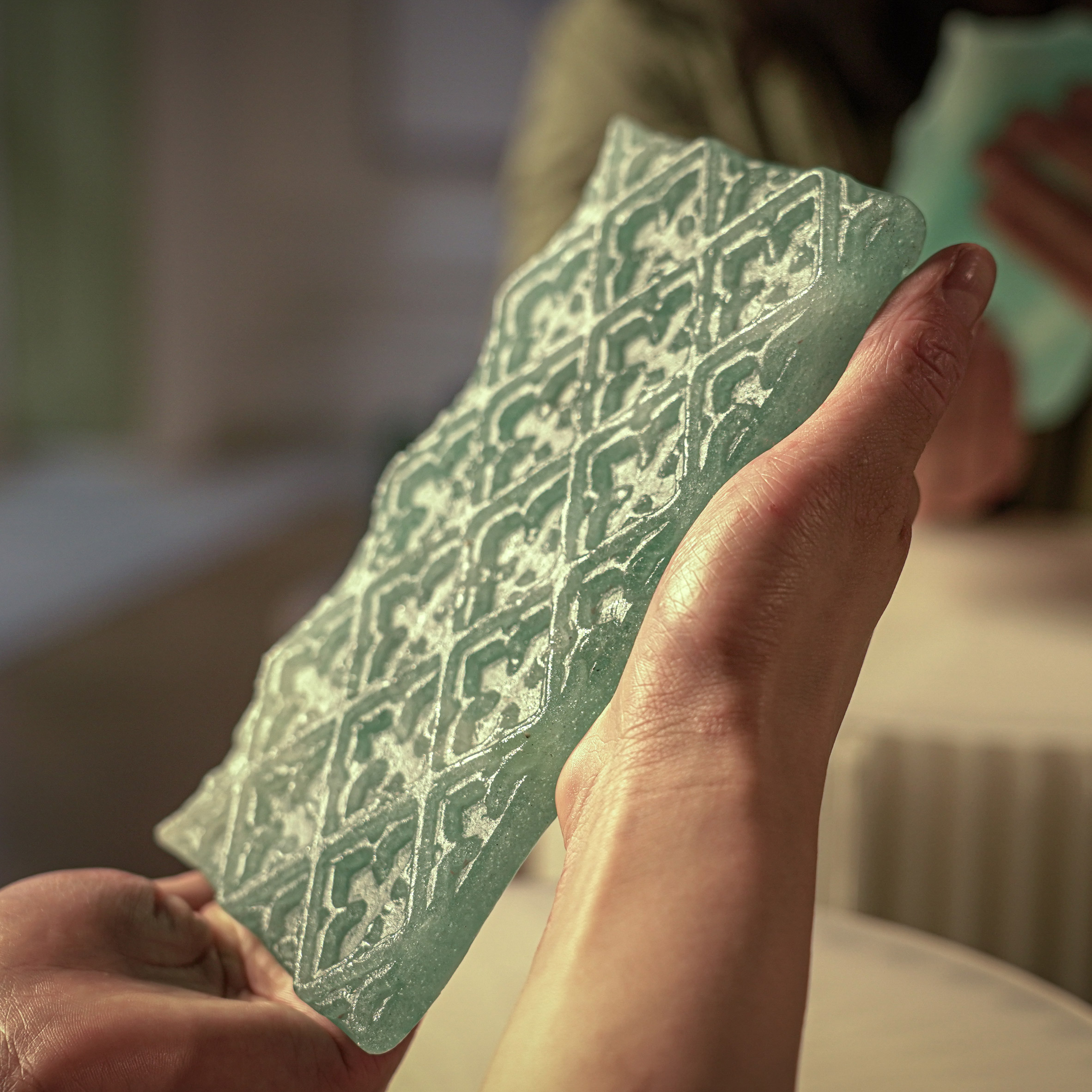 TechEstate_Tech's tweet card. Bureau de Change has produced a range of patterned tiles using Thames Glass, a biomaterial created by Lulu Harrison from mussel shells.