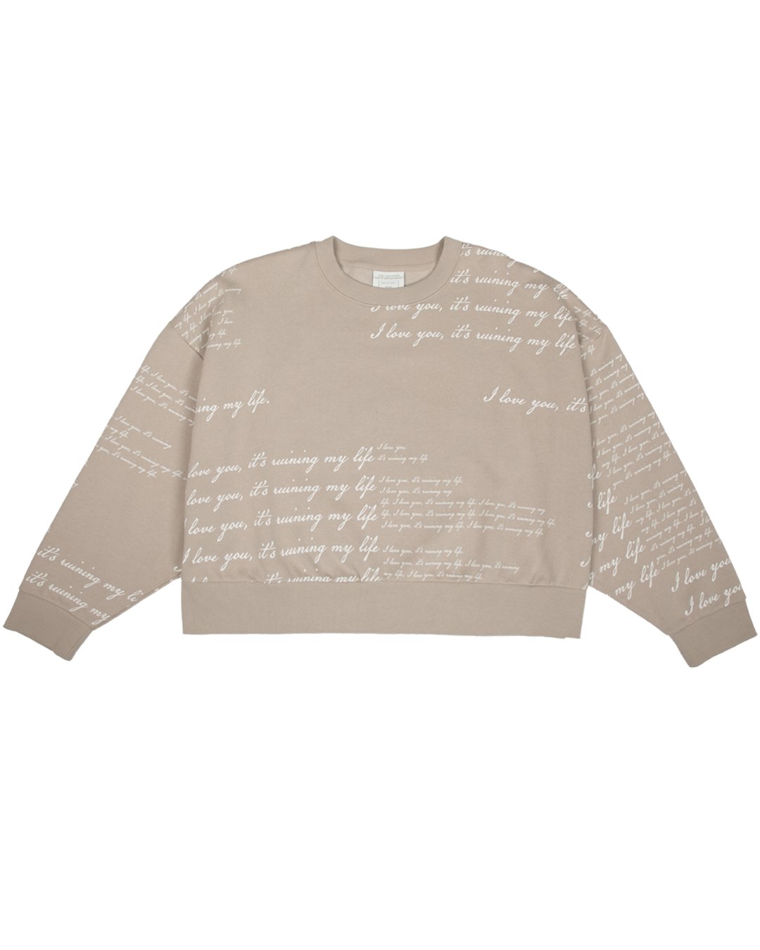 AlertsForMerch's tweet card. Beige boxy crewneck featuring "I Love You, It's Ruining My Life" song lyrics all over print.Relaxed cropped fit.75% cotton, 25% polyesterLimit 10 per order.Please note due to the custom all over...
