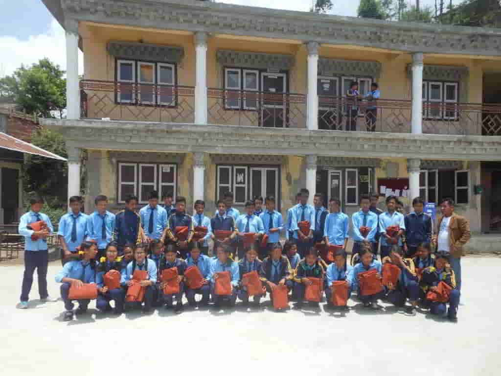 Dorje_sDooing's tweet card. Sherpa Adventure Gear donated ponchos for students in Thangpalkot.