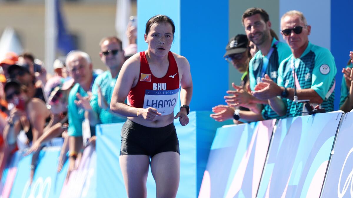 kbaxter11's tweet card. Kinzang Lhamo of Bhutan was the final runner to cross the finish line in the women's marathon, showing what it truly means to be an Olympic athlete.