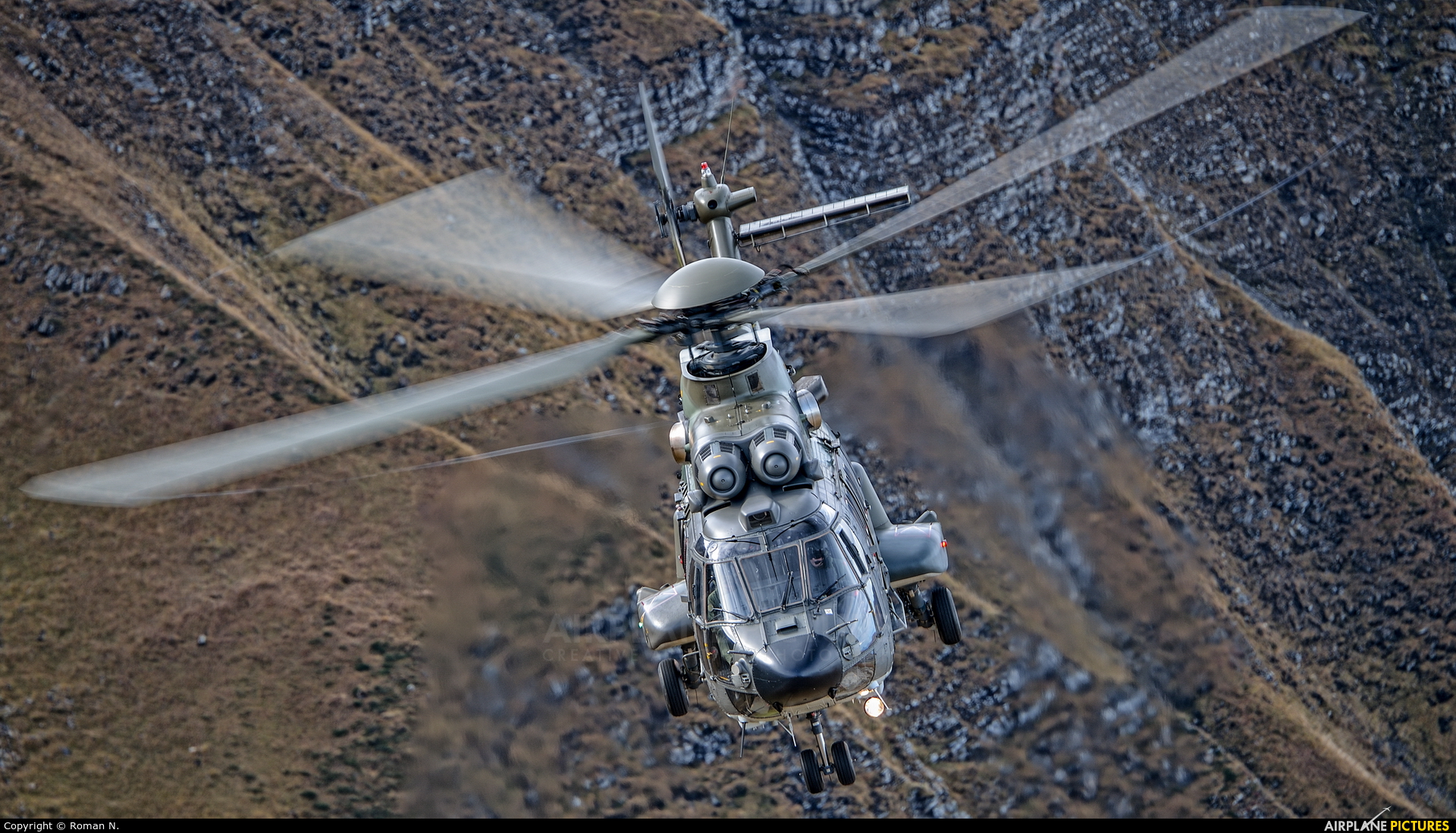 AirplanePics's tweet card. Switzerland - Air Force | Aerospatiale | AS532 Cougar | T-333 | Switzerland, Axalp - Ebenfluh Range (. - .) | Photo taken by Roman N.