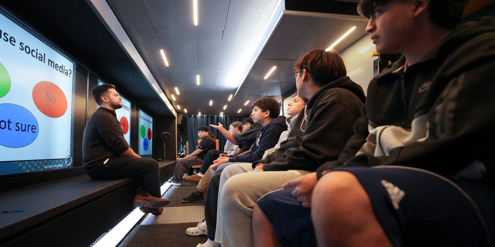 MelindaJPerson's tweet card. Suffern Middle School students learn about digital empowerment in a classroom on wheels from the Mobile Museums of Tolerance.